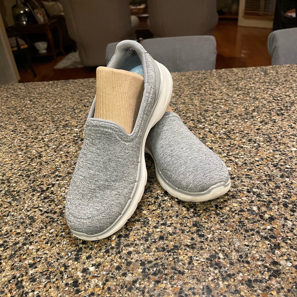 Gray slip on Skechers size 8.  Barely worn.